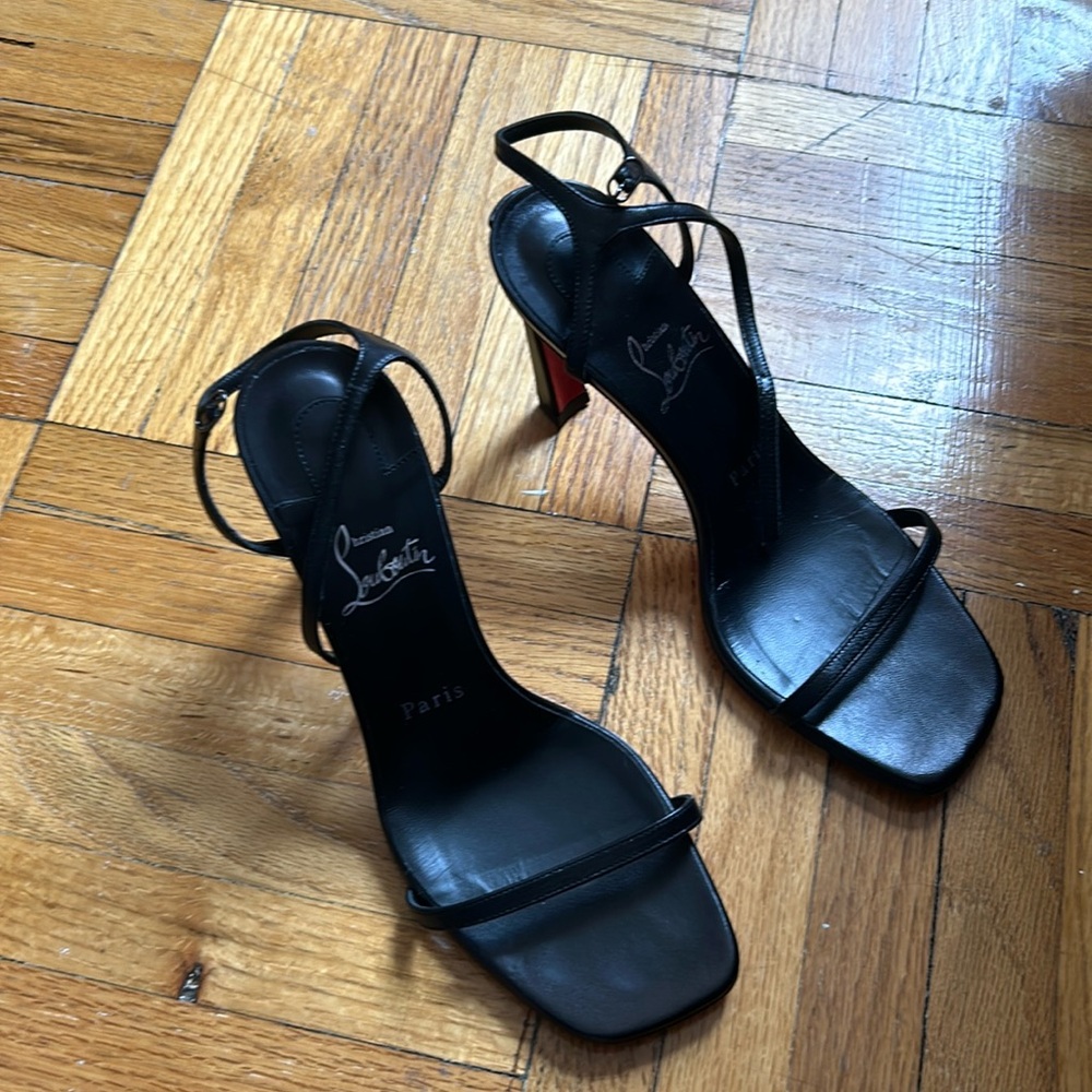 Christian Louboutin heeled sandals. Worn once, scuffed a bit on the bottom.